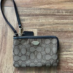Coach tan and beige wristlet with attached strap